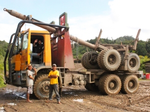 Sarawak logging truck and logging workers